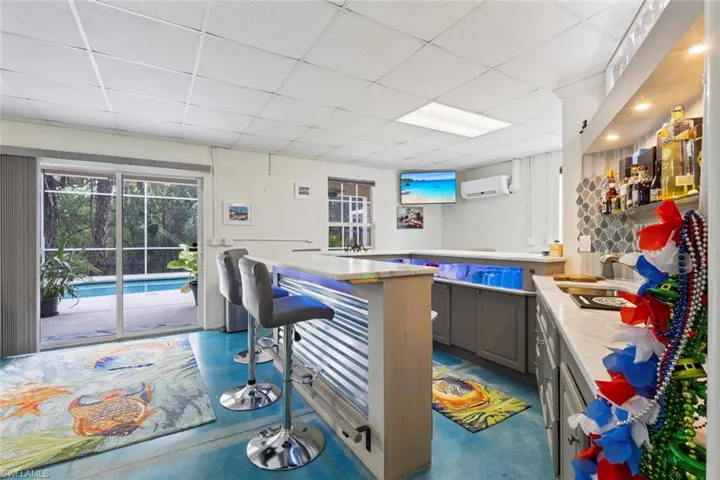 1st floor bonus space with a bar, just off the pool.  Perfect for entertaining