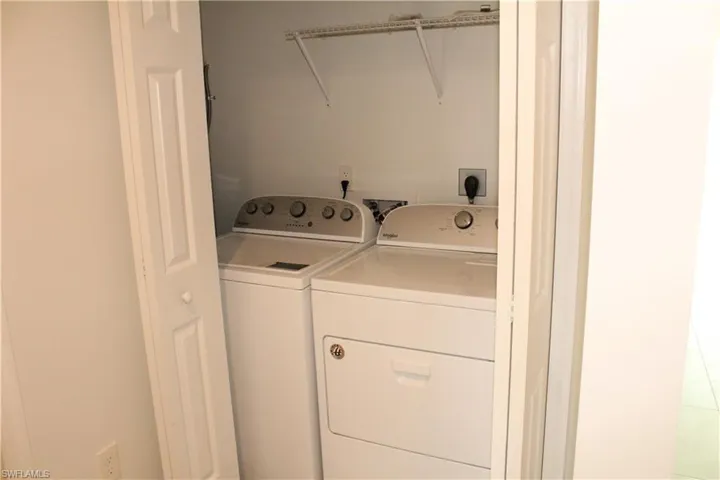 Laundry area featuring washing machine and dryer