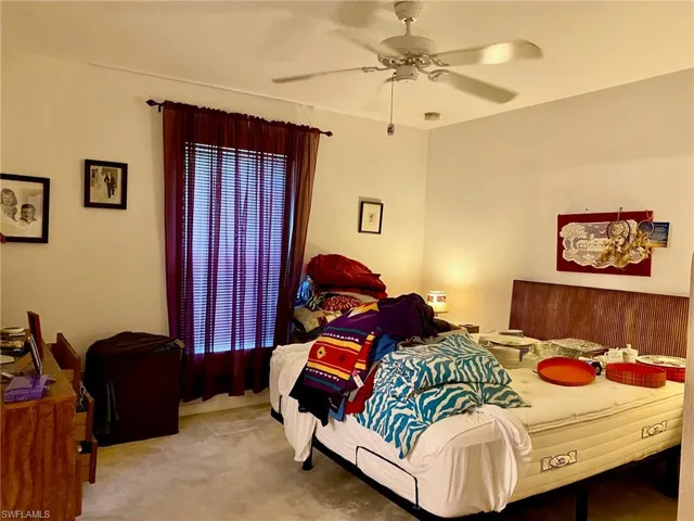 Bedroom featuring carpet flooring and ceiling fan