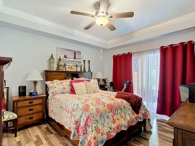 Tray ceiling featuring crown molding