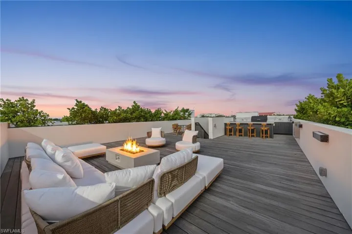 PRIVATE roofdeck with firepit, and outdoor kitchen