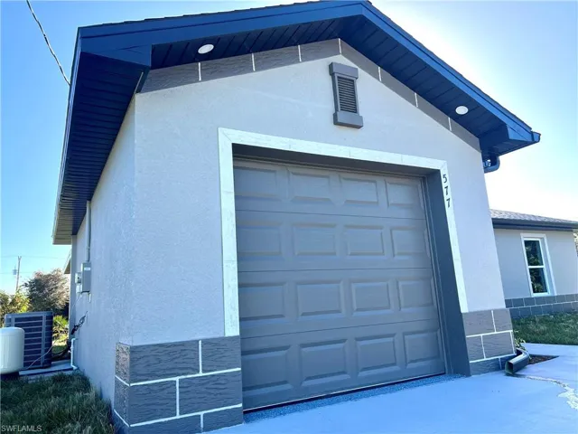 Garage with central AC unit