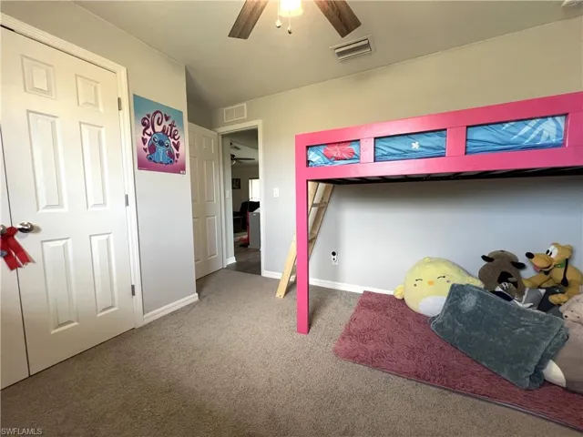 Bedroom featuring carpet floors and a ceiling fan