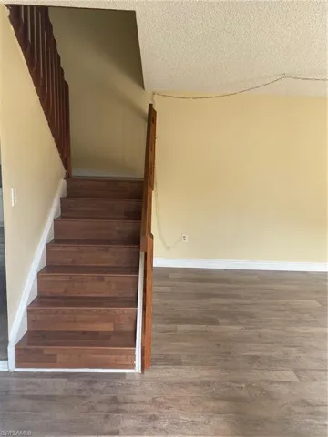Staircase featuring vinyl steps.