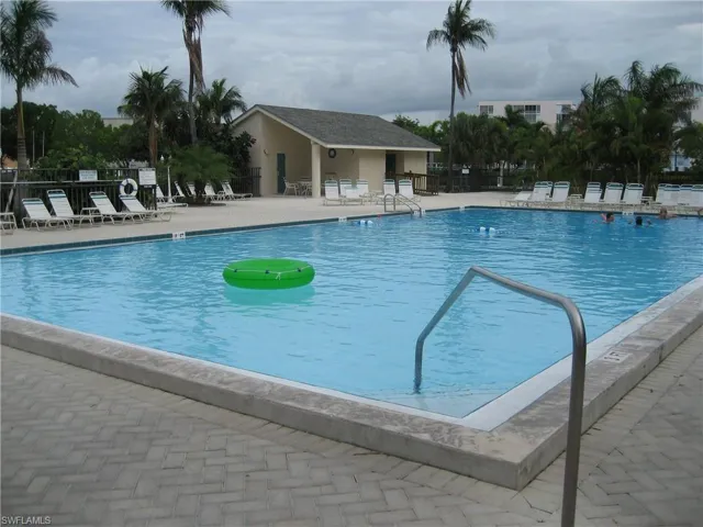 Community pool featuring a patio.