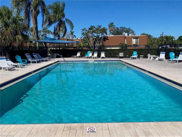 Community pool featuring a patio.