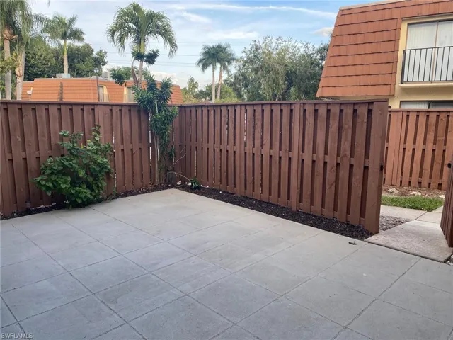 Gate with a fenced courtyard.