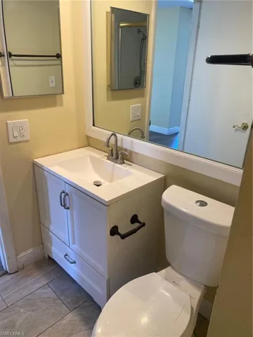1st floor bathroom with vanity.