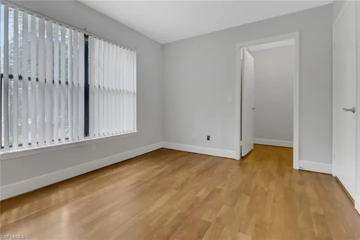 Unfurnished room with light hardwood / wood-style floors