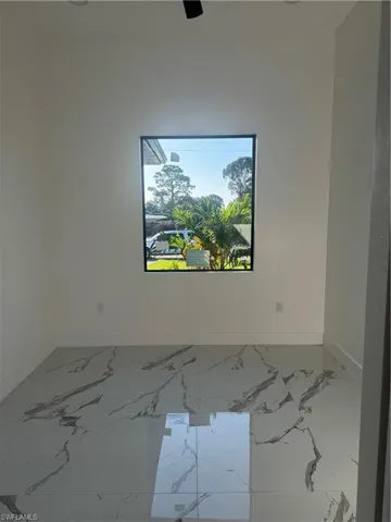 View of tiled spare room