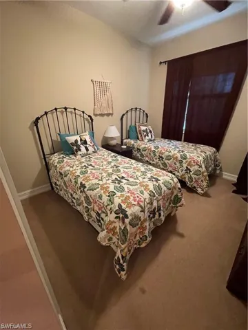 Guest bedroom has 2 twin beds New Carpeting