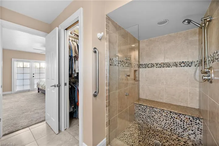 Primary Bath with Spacious Walk In shower with Multiple Shower Heads and Body Jets
