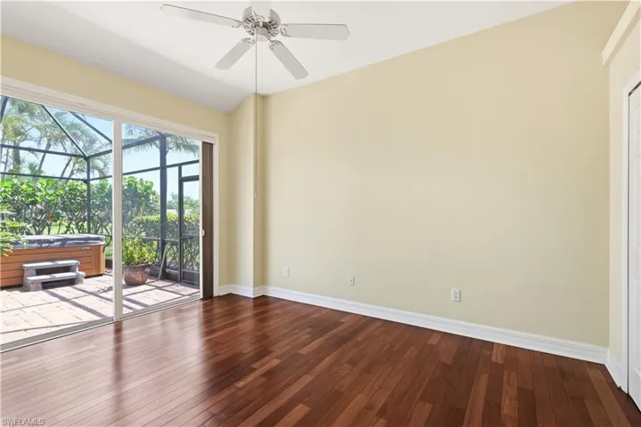 Bedroom with slider to pool