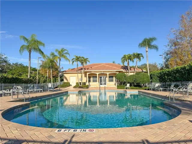 Community pool featuring a patio area