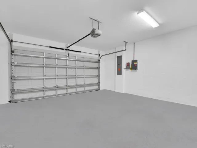 Garage featuring electric panel