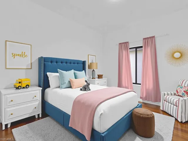 Bedroom featuring dark wood-style flooring