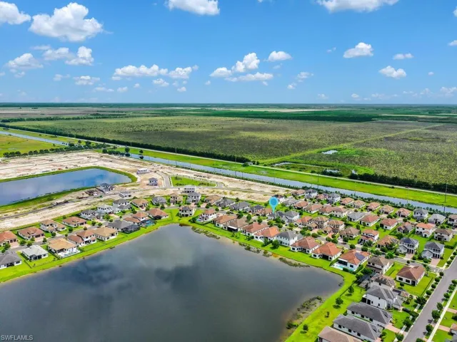 Aerial view of residential area with a nearby body of water