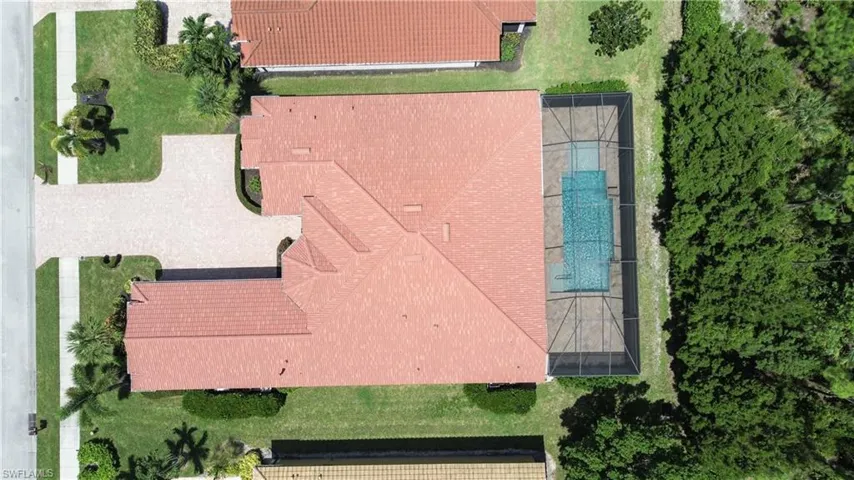 View of subject property featuring a pool area