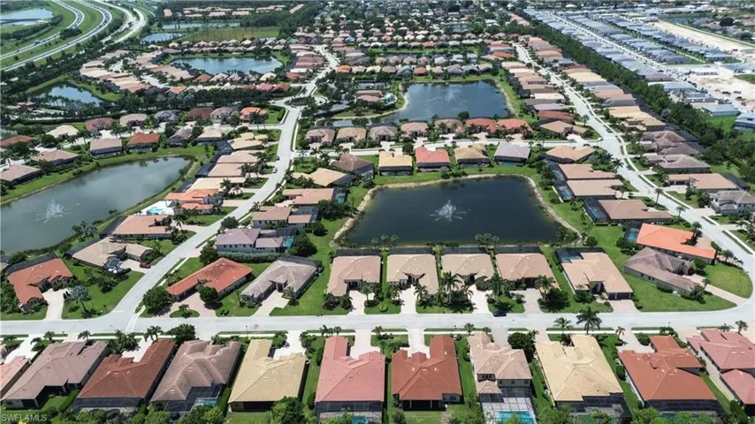 Aerial overview of property's location with nearby suburban area