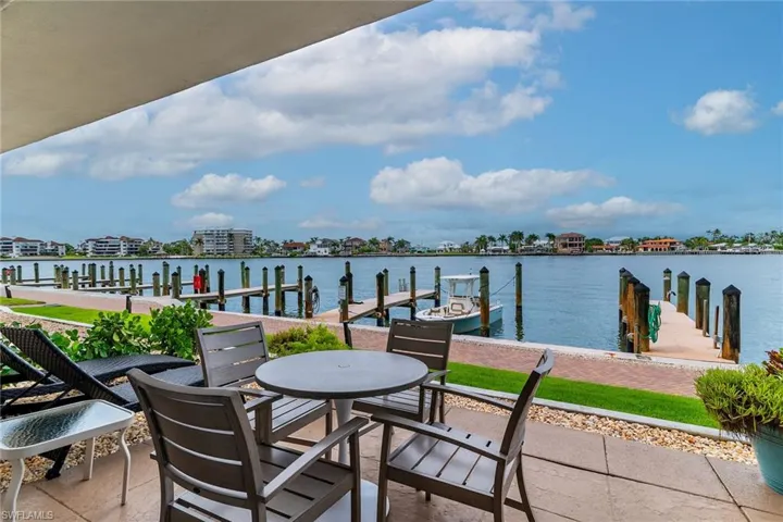Patio with an amazing view of the dock and passing dolphins!