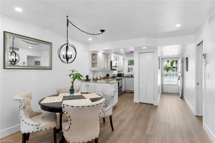 Dining area with view of kitchen and pantry