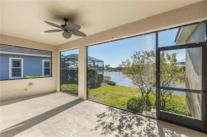 Great screened lanai overlooking the lake on the rear of the home.