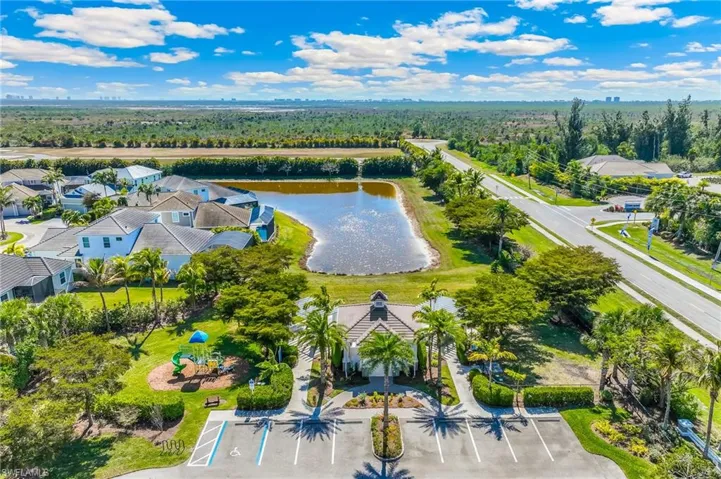 Aerial view of the community park area with a playground and dog park.