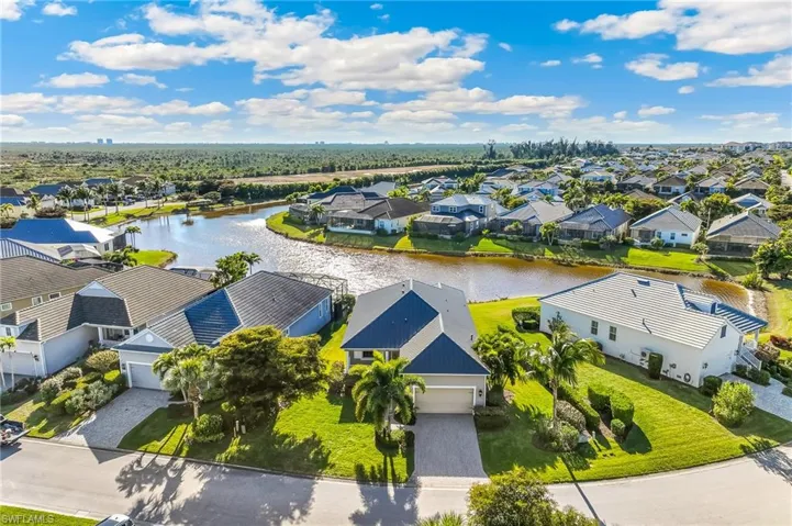 Aerial view of the home and community views.