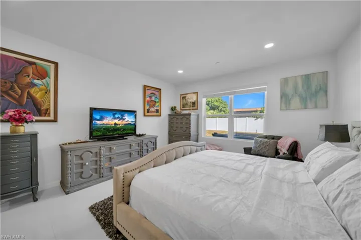 Bedroom featuring recessed lighting