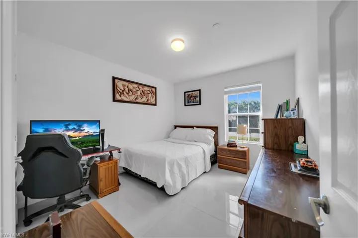 Bedroom with an office area