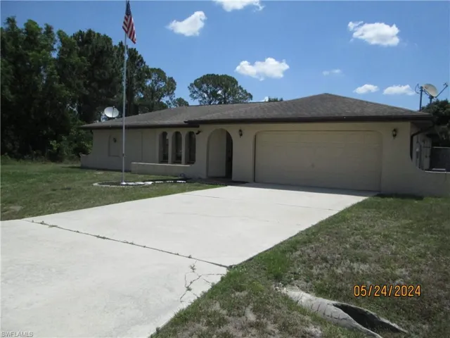 714  Jackson  AVE, Lehigh Acres, FL 33972