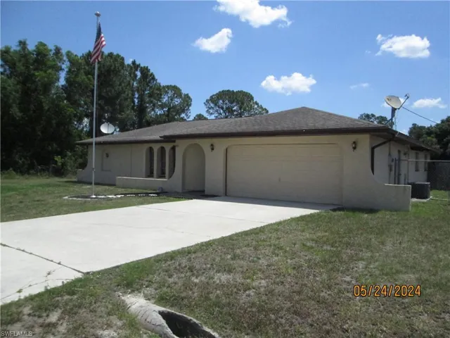 714  Jackson  AVE, Lehigh Acres, FL 33972