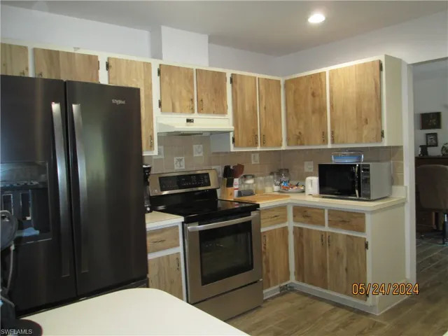 714  Jackson  AVE, Lehigh Acres, FL 33972