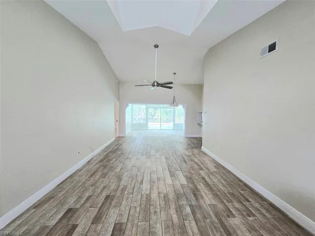 Great Room facing Florida Room w/Plank Tile Flooring