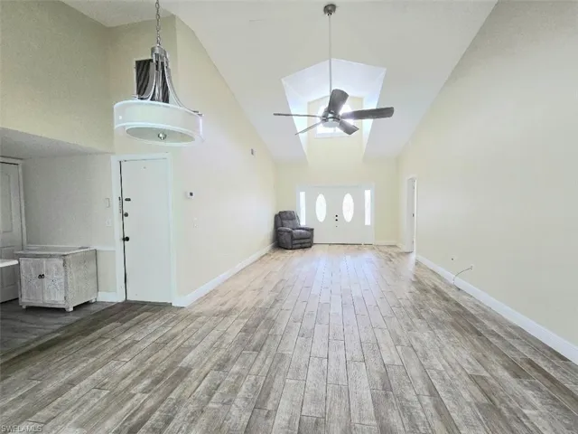 Great Room w/Double Door Entry & Vaulted Ceiling