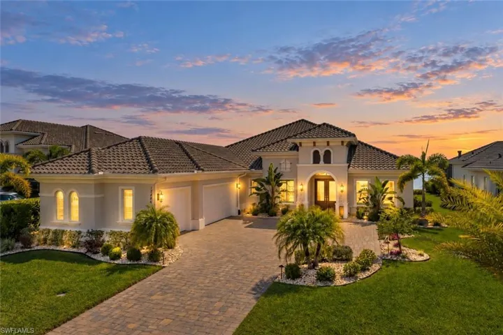 Welcome to 17424 Blue Sapphire Dr.. This stock-built Sterling III floor plan with bonus room offers southern exposure and long lake views with protected preserve in the distance.