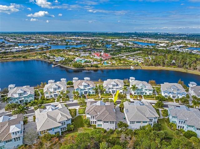 Privacy! The rear of the coach home faces a never-to-be-built-on nature preserve. Access to the Cypress Waterway is directly across the street. The Isles Club and community amenities are a short walk away.