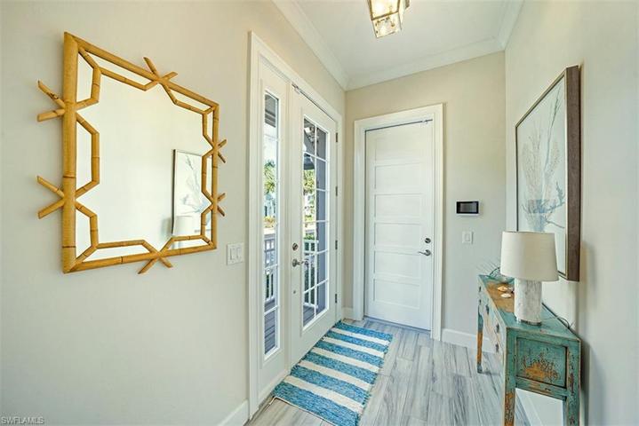 Foyer with access to the 2-car garage.