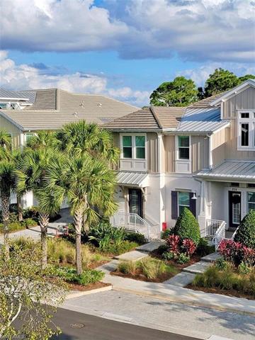 The front of this beautifully landscaped coach home faces the Cypress Waterway, just across the street.