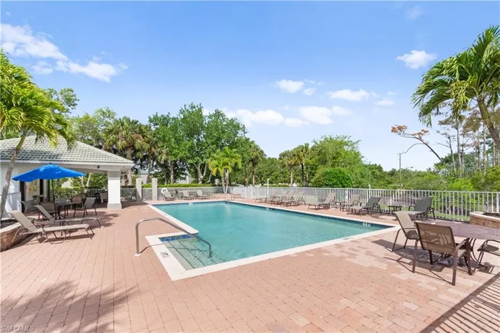 Community pool featuring a patio area