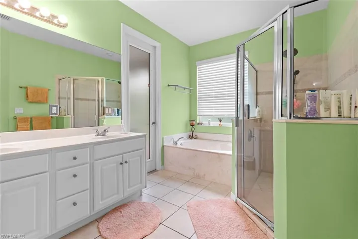 Primary bathroom with soaking tub and walk-in shower