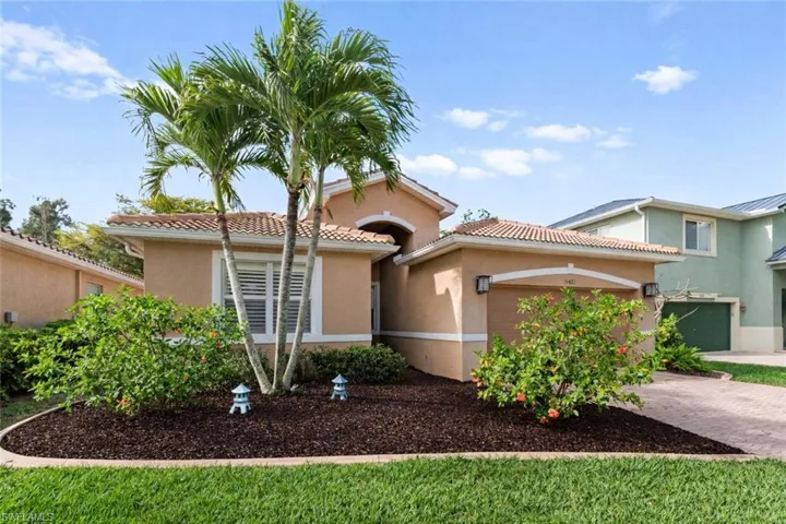 Welcome Home! New tile roof, paver driveway, lawn care included in the HOA fees!