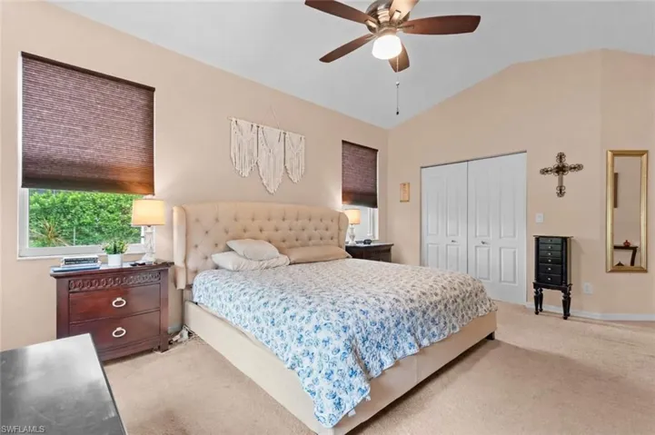 Primary bedroom with walk-in closet