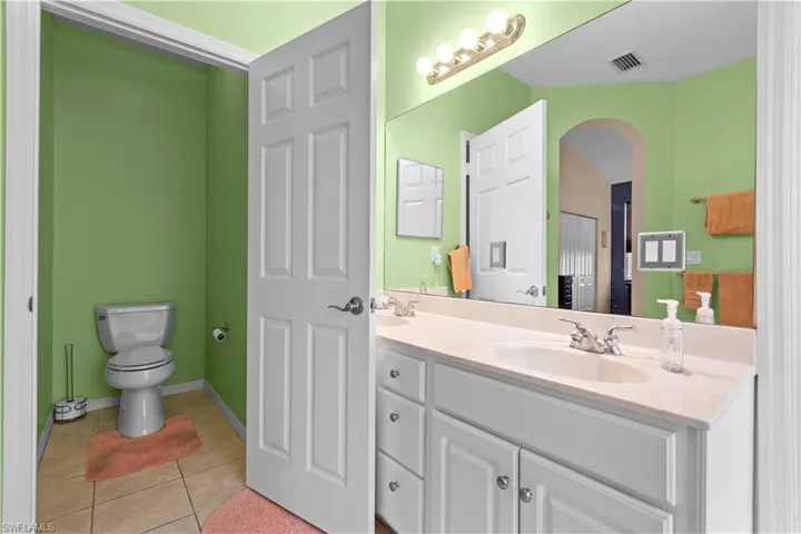 Primary bathroom with separate water closet