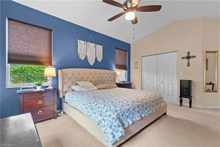 Primary bedroom with walk-in closet