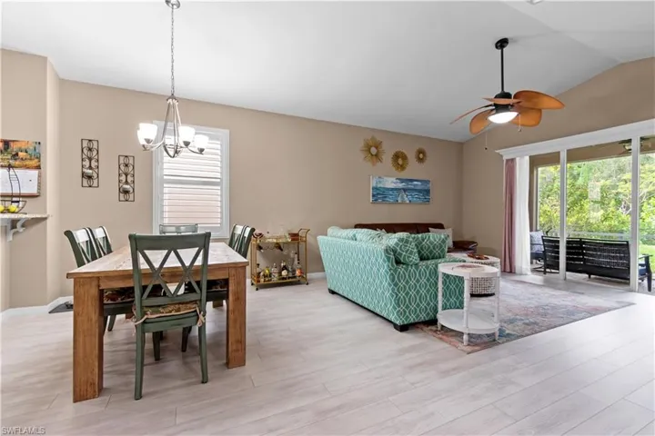 Great Room with vaulted ceilings, Plantation shutters and sliders leading to your lanai