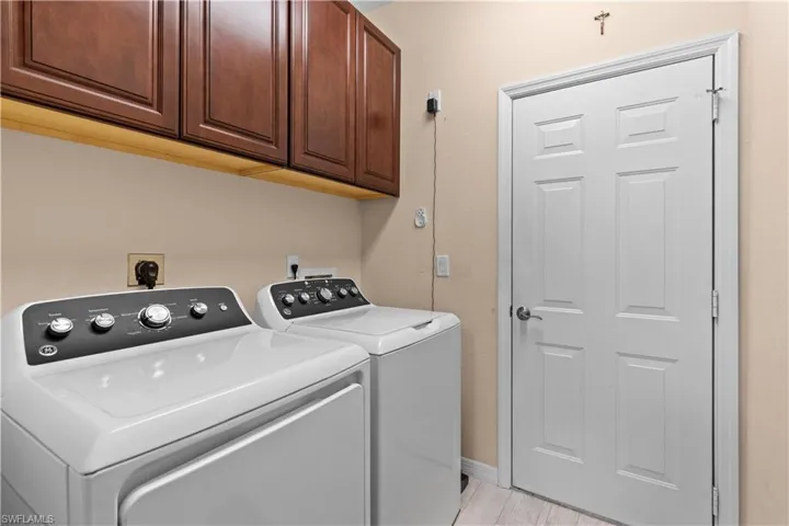 Laundry area with brand new washer and dryer
