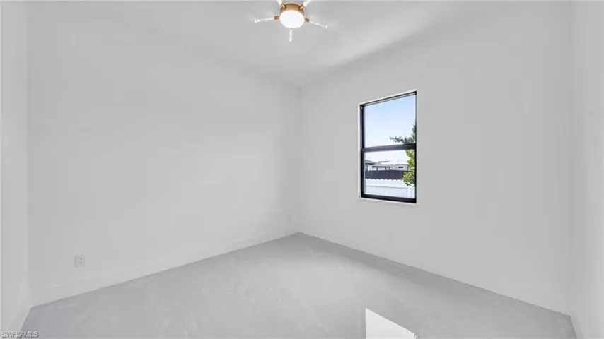 Empty room with baseboards