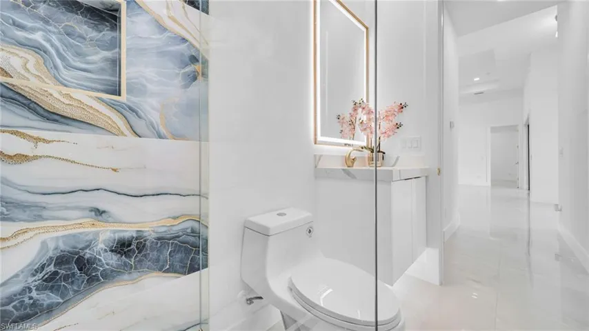 Bathroom with recessed lighting and tile patterned floors