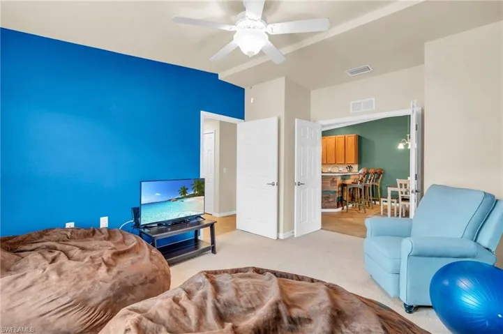 Den with ceiling fan